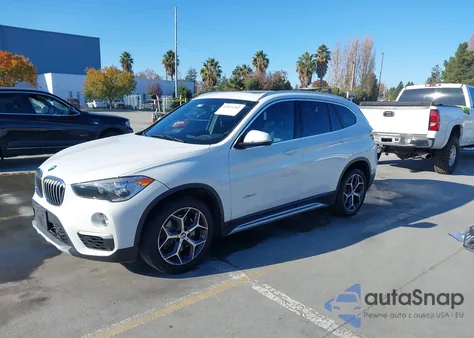 2018 BMW X1 xDrive28I z USA, uszkodzony, nr VIN WBXHT3C36J5K30649